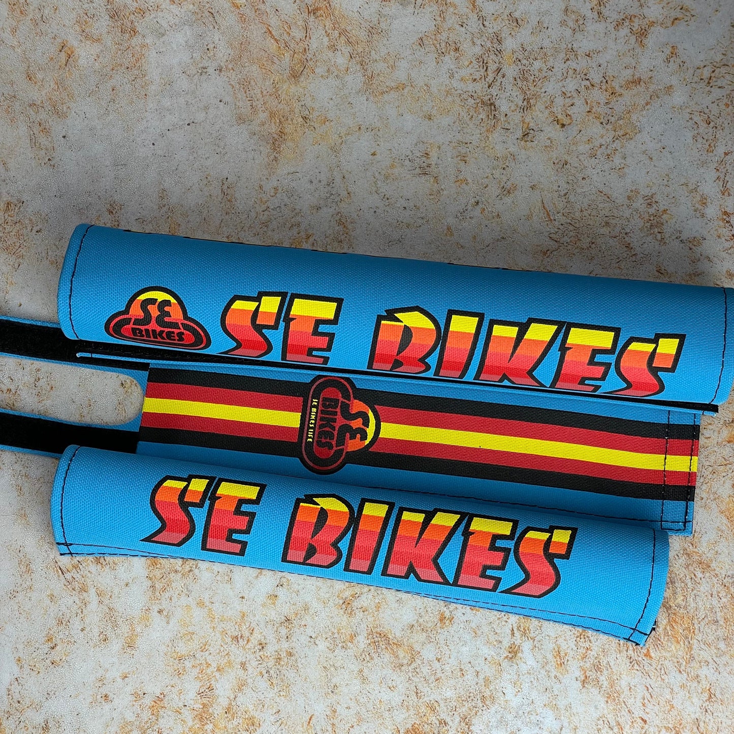 SE Bikes Wheelie Parts Blue/Rainbow SE Bikes Pad Set