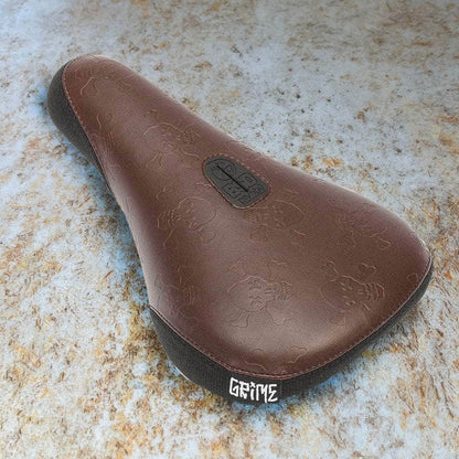 BSD BMX Parts Brown / Fat BSD Grime Skull Repeat Pivotal Seat Brown