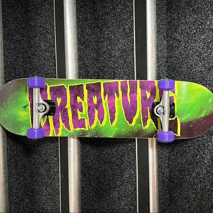 Creature Skateboards Creature Galaxy Logo Green/Purple 7.8" Complete Skateboard