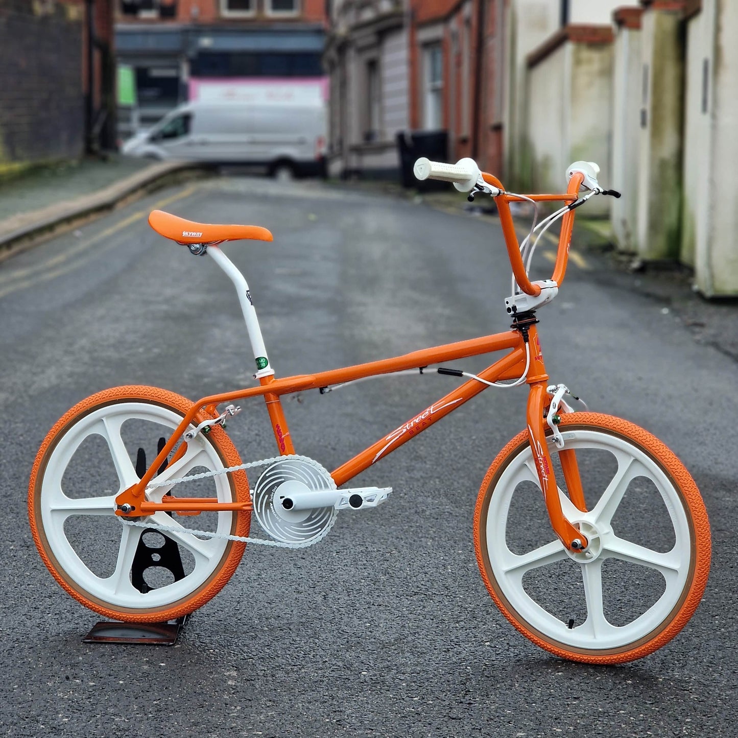 Skyway Old School BMX Bikes Orange Skyway Street Beat Custom Bike Orange / White