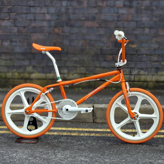 Skyway Old School BMX Bikes Orange Skyway Street Beat Custom Bike Orange / White