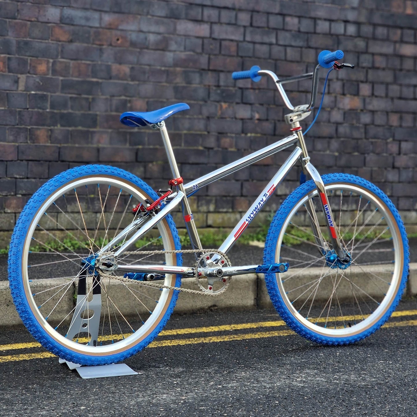 Skyway Old School BMX Bikes Chrome / Blue / Red Skyway T/A Custom 26 Inch Bike White / Blue / Red