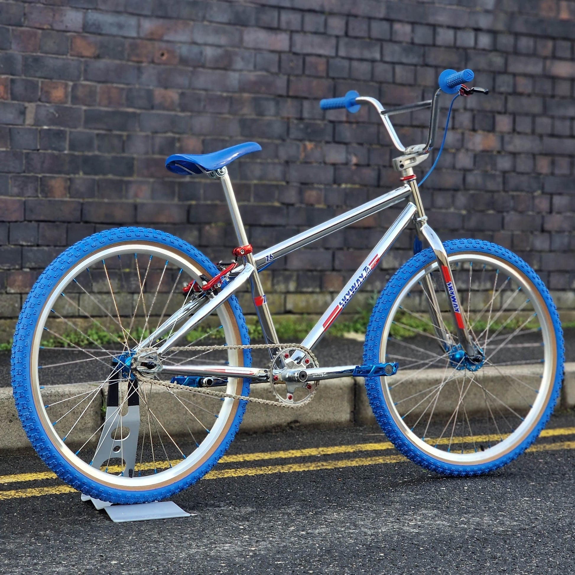 Skyway Old School BMX Bikes Chrome / Blue / Red Skyway T/A Custom 26 Inch Bike White / Blue / Red