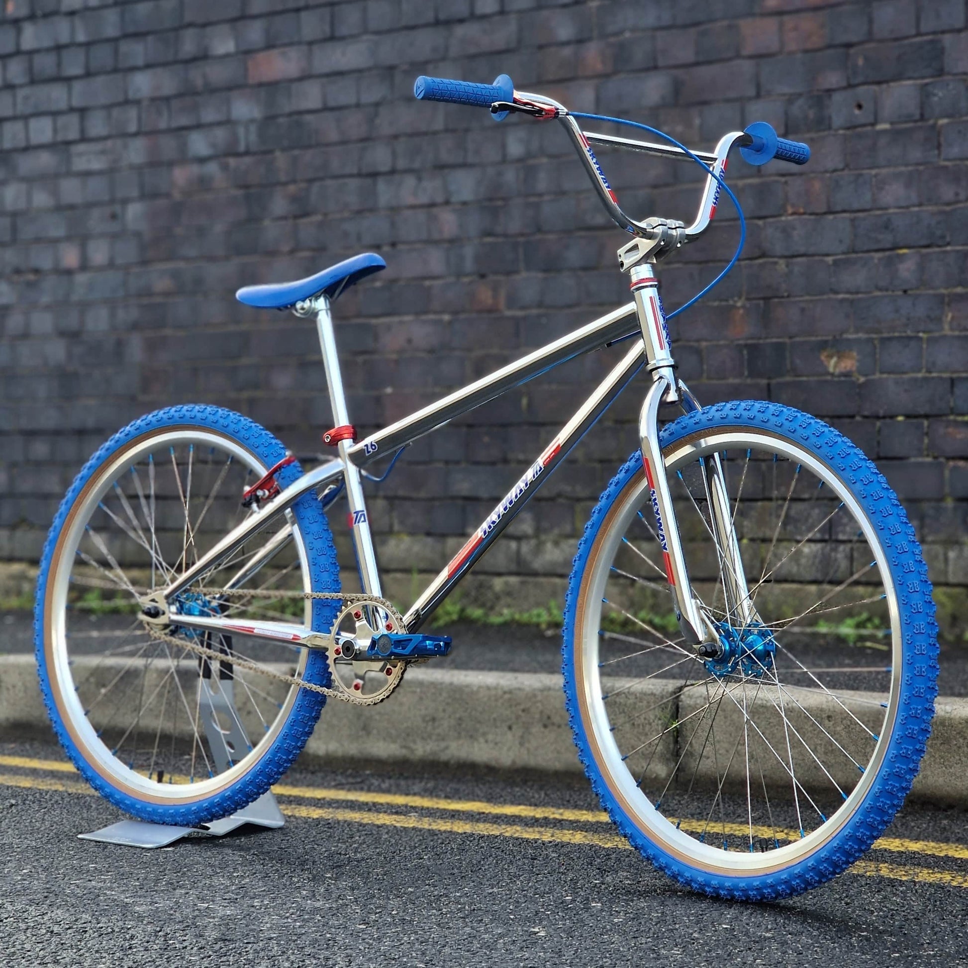 Skyway Old School BMX Bikes Chrome / Blue / Red Skyway T/A Custom 26 Inch Bike White / Blue / Red