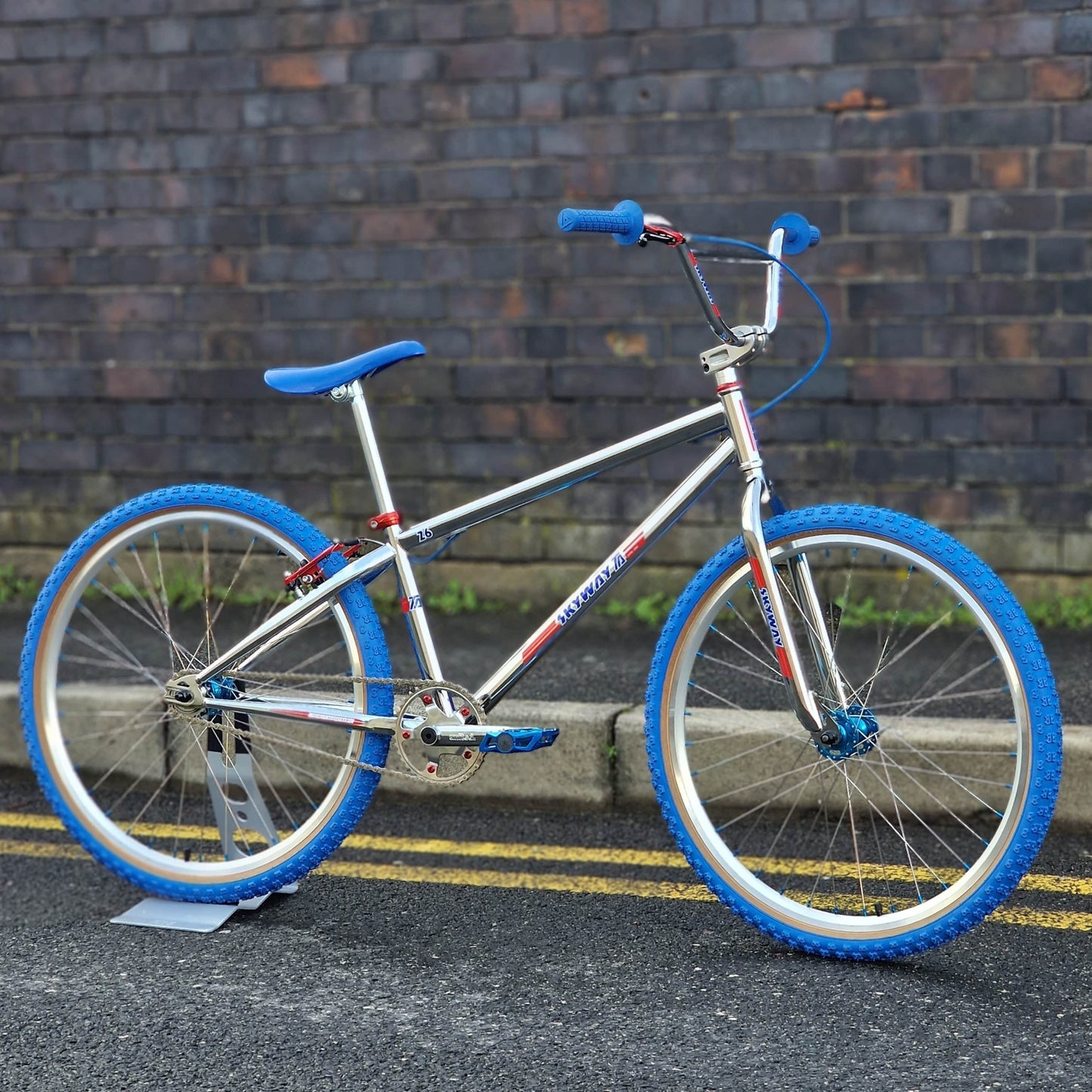 Skyway Old School BMX Bikes Chrome / Blue / Red Skyway T/A Custom 26 Inch Bike White / Blue / Red