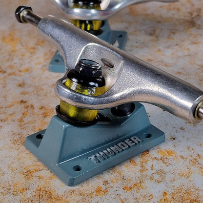 Thunder Skateboards 148mm / Polished/Teal Thunder Team Medieval Polished / Teal Skateboard Trucks Pair